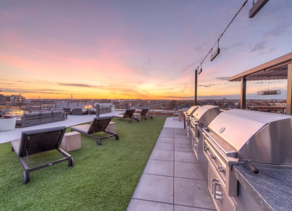 Outdoor grills and lounge chairs