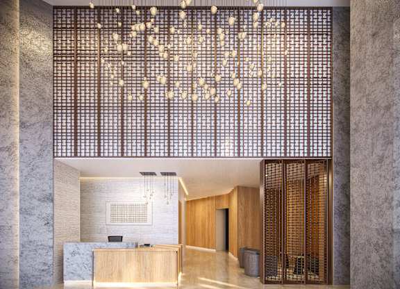 A reception area with a wooden partition and a reception desk.