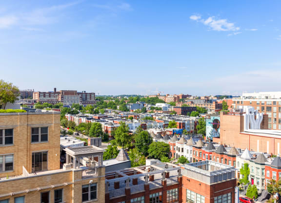 a view of the city from the top of a building
