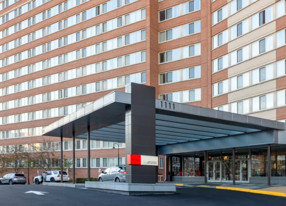 a large brick building with an awning in front of it