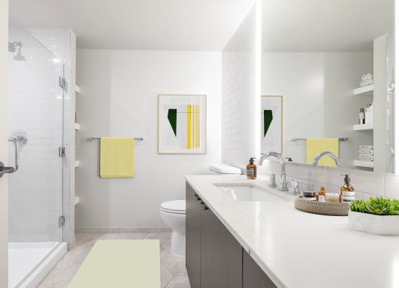 a bathroom with white walls and white countertops