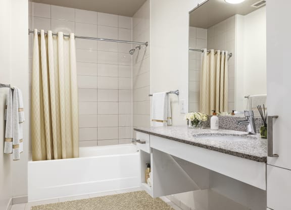 a bathroom with a sink and a bathtub