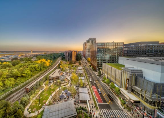 an aerial view of a city with a park and highways at The Grace and Reva, Arlington
