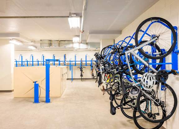 A bike parking area with bikes on racks.