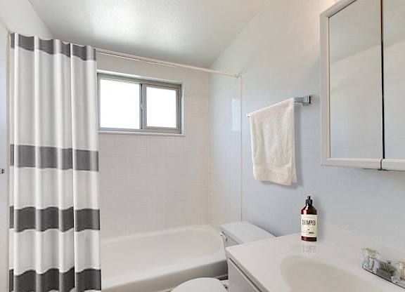Bathroom with White Tub at Proto Apartments, Colorado