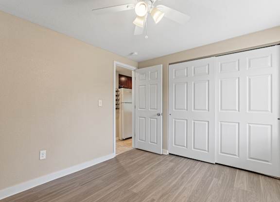 room with multiple doors at Kingsbrook Arms, Englewood, 80113