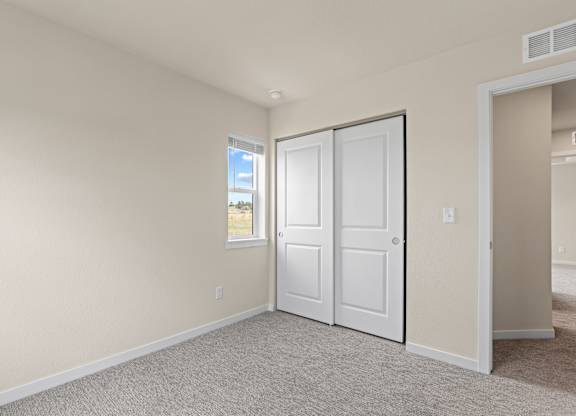 Comfortable Bedroom With Large Closet at The Townhomes at Pine Drive, Colorado, 80138