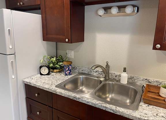 kitchen with steel sink at Kingsbrook Arms, Englewood Colorado