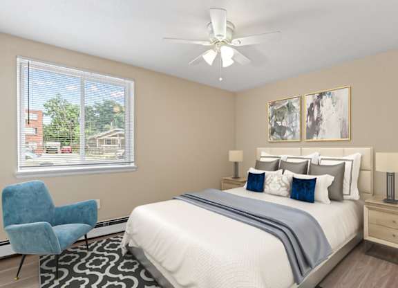 bedroom with chair at Kingsbrook Arms, Englewood, Co