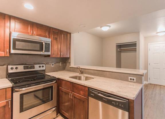 Fully Equipped Kitchen With Modern Appliances at Valencia Gardens, Colorado, 80304