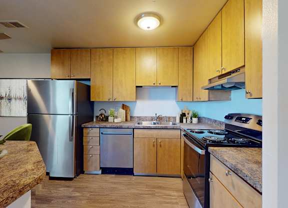 Kitchen with Wooden Cabinets at Villa Parada Apartments, Colorado, 80110