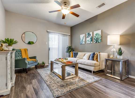 the heights on capitol hill apartments living room with ceiling fan