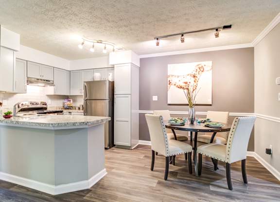 Pet Friendly Apartments in Roswell, GA - 2200 Big Creek Apartments - Dining Room and Kitchen Area
