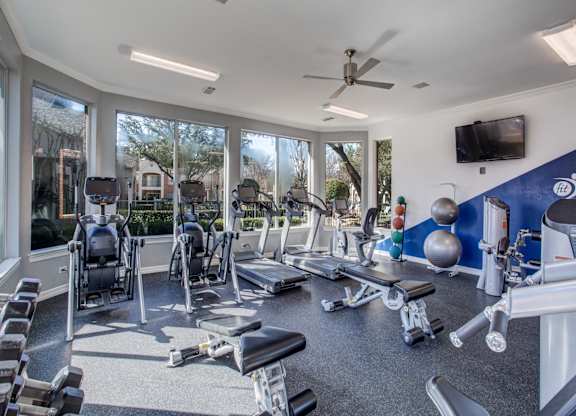 Plano, TX Apartments for Rent - Carrington Park Fitness Center with Treadmills, Free Weights, and Ellipticals