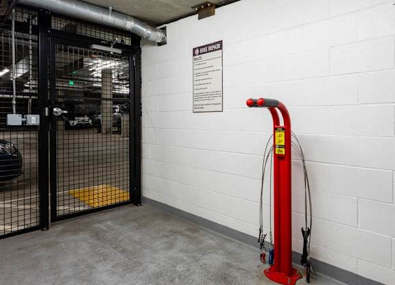 Pet-Friendly Apartments in Nob Hill Portland, OR - The Cordelia - Parking Garage with Bike Repair Center, Gated Entry, and Outlets
