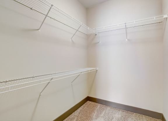 Pet-Friendly Apartments in Nashville, TN- Octave Apartments- large walk in closet with built in shelves