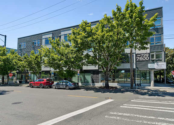 A street view with a building number 7600.