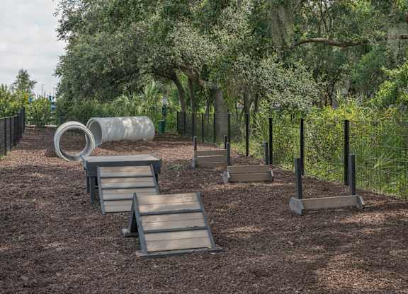 Riverview, FL Apartments – Sole at Brandon - leash free dog park with agility equipment