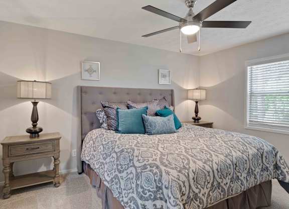 Glen Lake Apartments in Atlanta, GA 30328 photo of a bedroom with ceiling fan