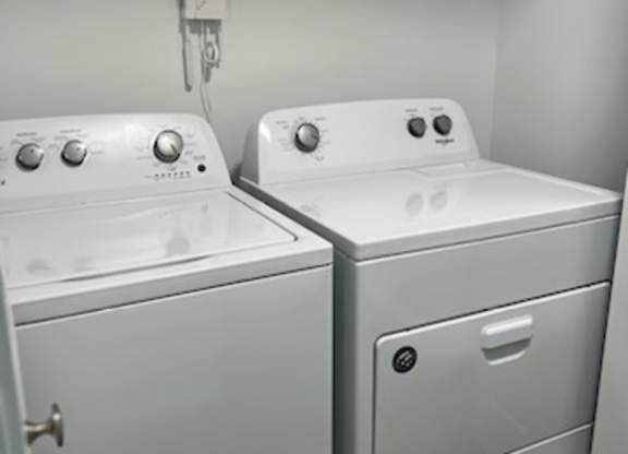 a white washer and dryer sitting next to each other