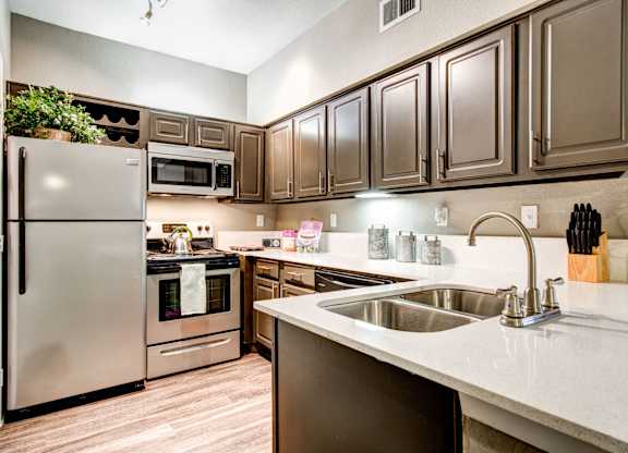 updated kitchen with stainless steel appliances