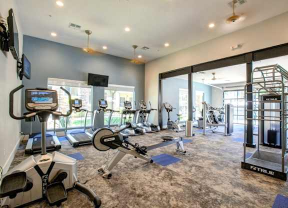 Phoenix, AZ Apartments for Rent - Ironhorse at Tramonto - Fitness Center With Exercise Bikes, Weights Machines, and More