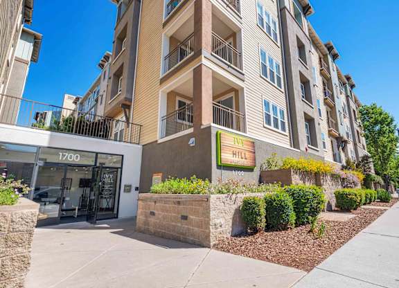 Apartments for Rent in Walnut Creek, CA - Ivy Hill - Building Exterior with Tan and White Details, Landscaping, and Street View