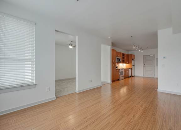 12 South Apartments - Nashville TN - kitchen with dark wood cabinets and stainless steel appliances