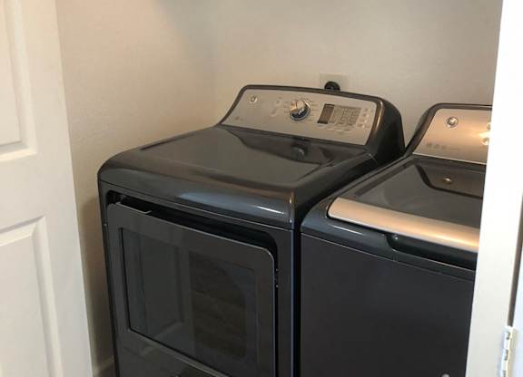 Apartments for Rent in Walnut Creek - Ivy Hill - An interior shot of the in-unit full size washer/dryer