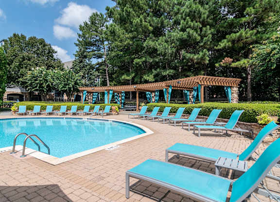 Apartments In Woodstock for Rent – Lea Woodstock –  resort style swimming pool with sundeck and lots of pool chairs