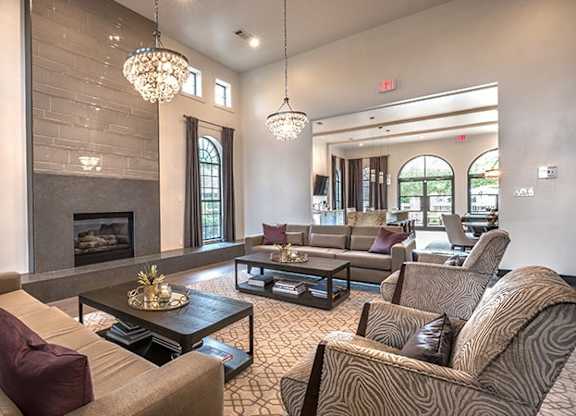 A living room with a fireplace and a couch.
