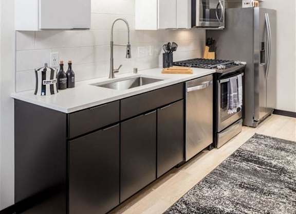 updated kitchen with stainless steel appliances