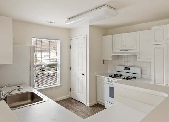 Orchards Apartments Marlborough ma apartment loft style apartments photo of kitchen with white appliances and white cabinets with wood floors and large window