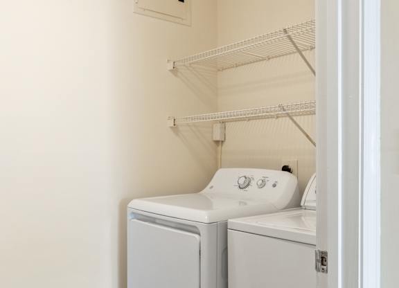 Orchards Apartments Marlborough ma apartment loft style apartments photo of  laundry room with full size washing machine and dryer with storage shelves