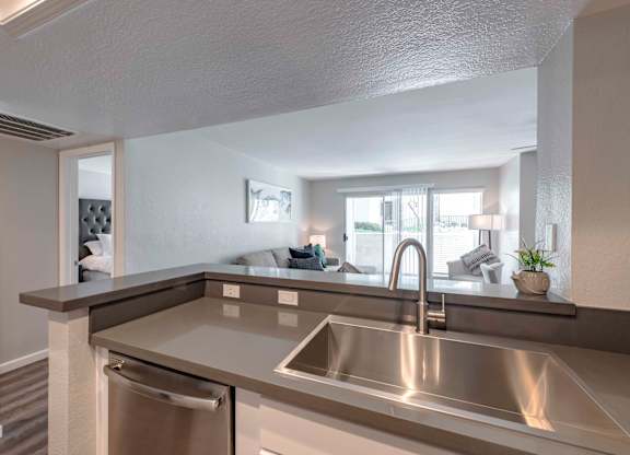 Apartments for Rent in San Clemente- Rancho Del Mar - Kitchen with Brushed Nickel Hardware & Fixtures and Hardwood-Inspired Flooring