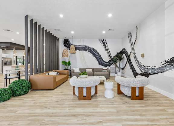 A modern living room with a large sculpture on the wall.