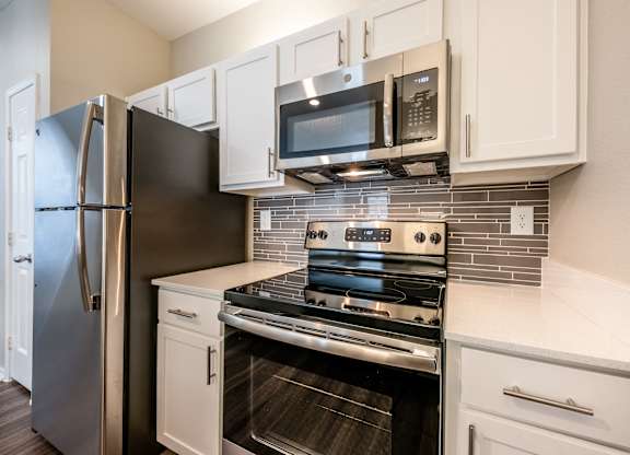 Regency at dell ranch kitchen stove and microwave