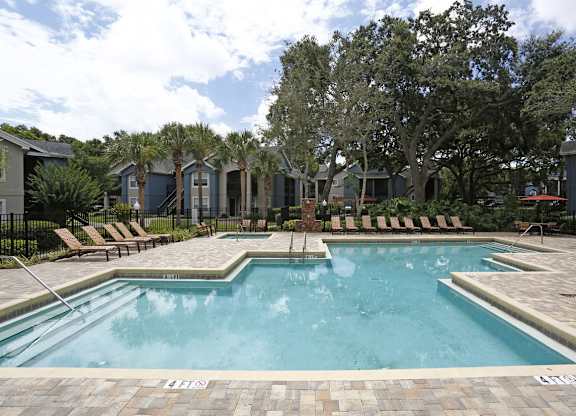 Stonegate Apartments in Palm Harbor, FL photo of Refreshing Swimming Pool and Jacuzzi
