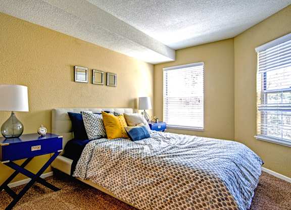bedroom with 2 windows