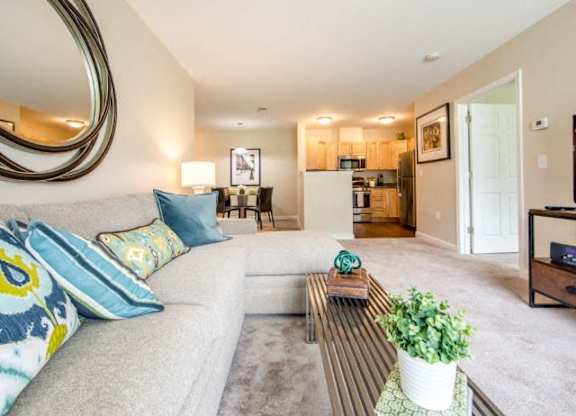 a living room with a couch and a coffee table