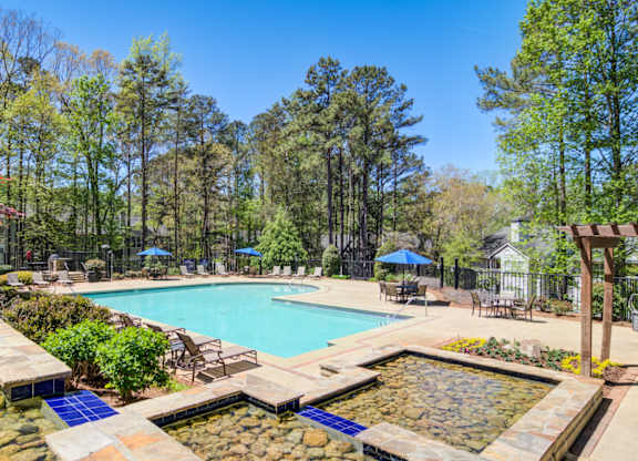Apartments in Marietta Georgia for Rent – Wood Pointe Apartments - A pool surrounded by trees