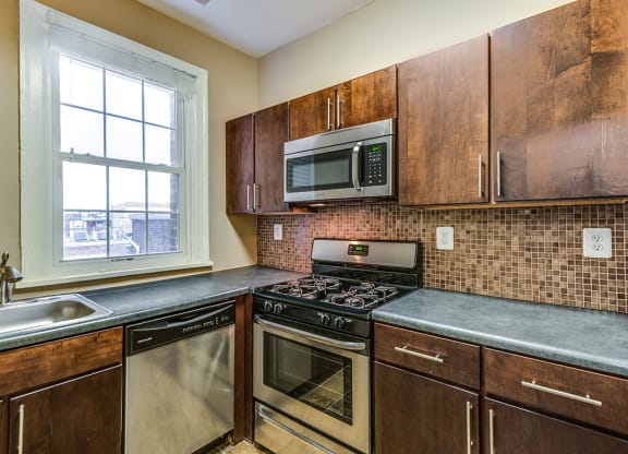 Renovated kitchen with stainless steel appliances at 1630 Park, Washington, 20010