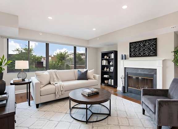 1633 Q living area with fireplace (virtually staged)