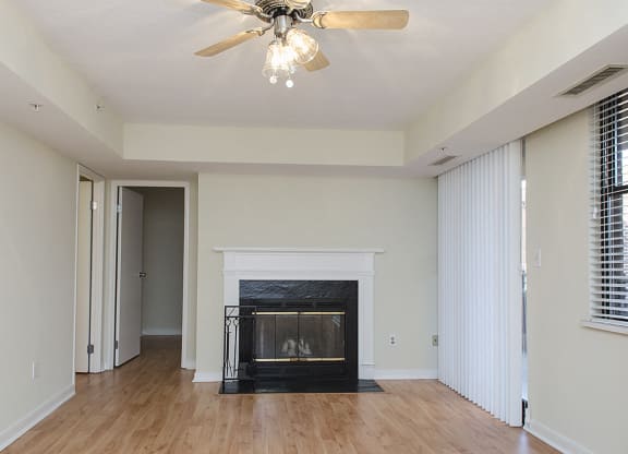 One-bedroom apartment living area with fireplace at 1633 Q, Washington
