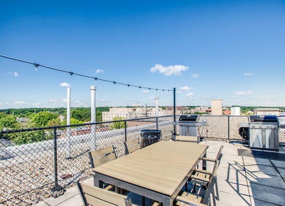Rooftop deck with tables and seating at 2100 Connecticut, Washington, 20008