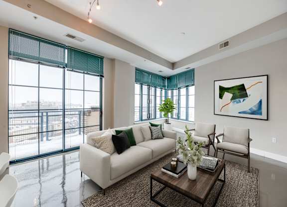 Living room with 10-foot ceilings with city views at Park Place at Petworth Station in Washington, DC 20011