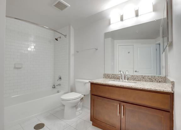 Bathroom with vanity cabinet at 1600 Penn SE Apts in SE, Hill East, Washington, DC 20003