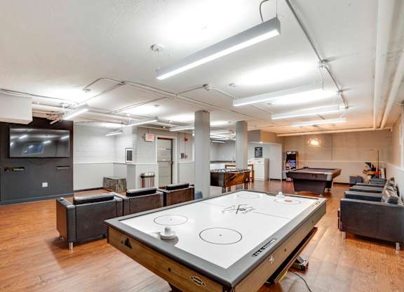 Game room with air hockey at Mason Hall in Alexandria, VA 22314