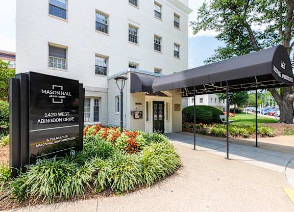 Exterior and sign at Mason Hall Apartments in Alexandria, VA 22314