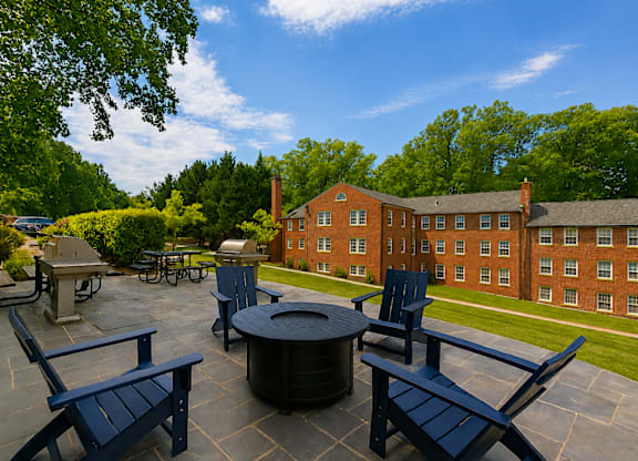 Park Crest Apartments Terrace with Fire Pit and Lounge Chairs